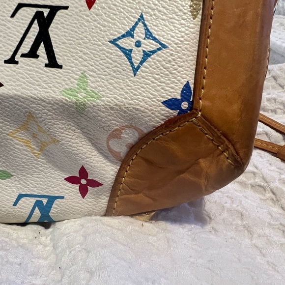 Authentic Luis Vuitton white multicolor URSULA shoulder bag . With red interior. - Picture 12 of 16